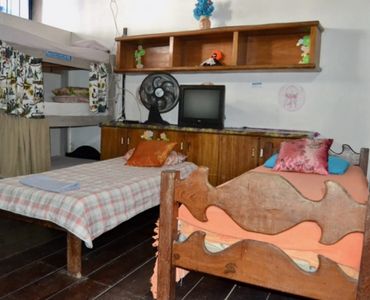 Cama em quarto compartilhado feminino